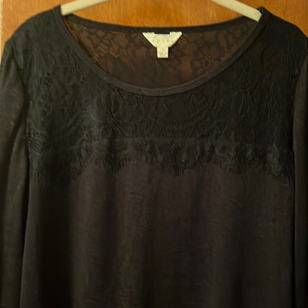 Black long sleeved top. Size large